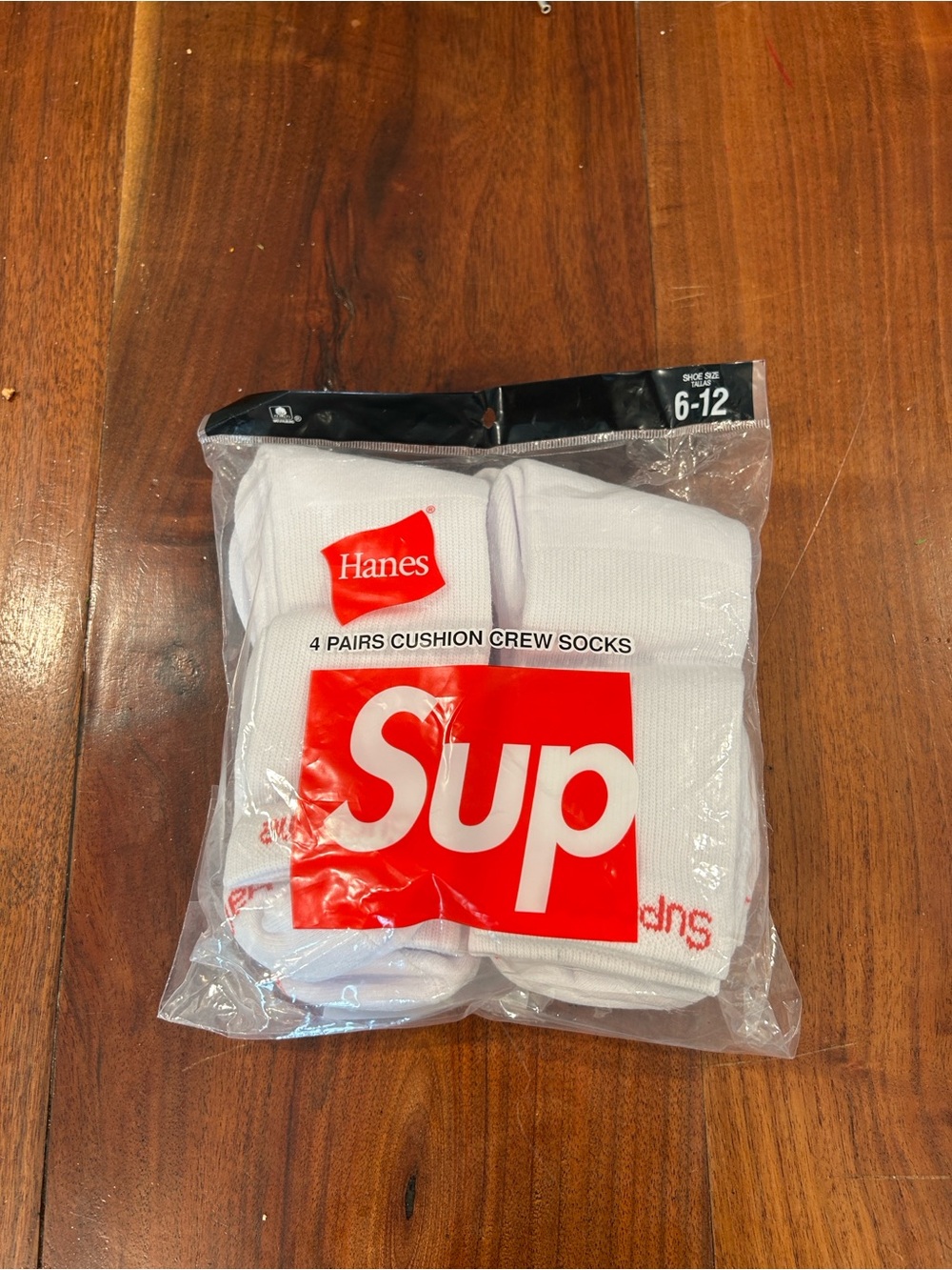 Hanes White Crew Socks with Red Sup Logo - 4 Pack